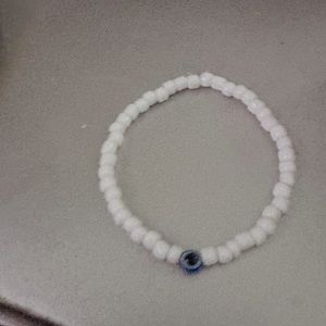 White with evil eye